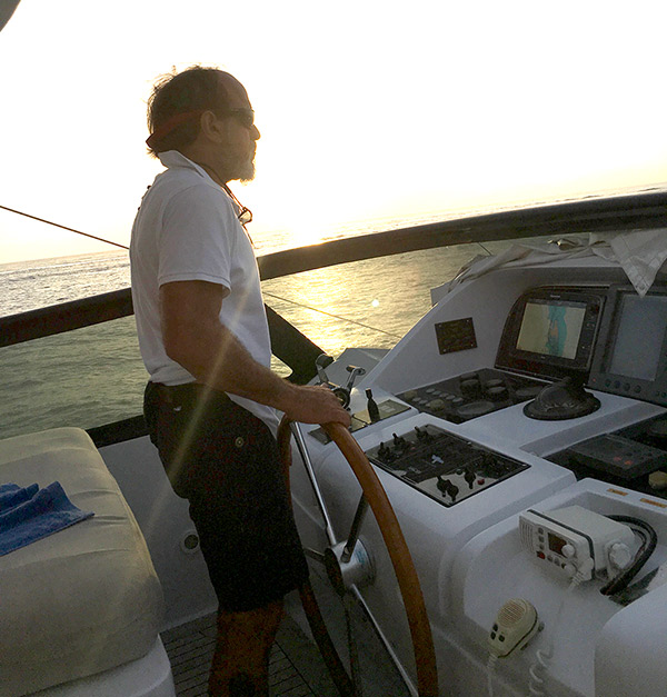 captain in luxury yacht