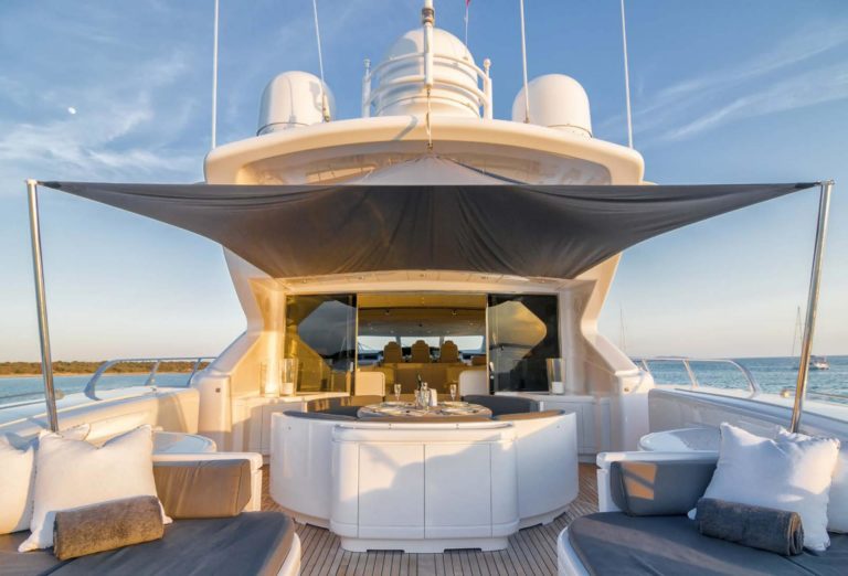 Four-Friends-mangusta-108-yacht-charter-Ibiza-aft-deck-2